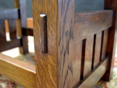 Detail beveled exposed pinned through-tenon.